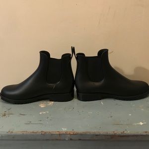 Black rubber rain boots
